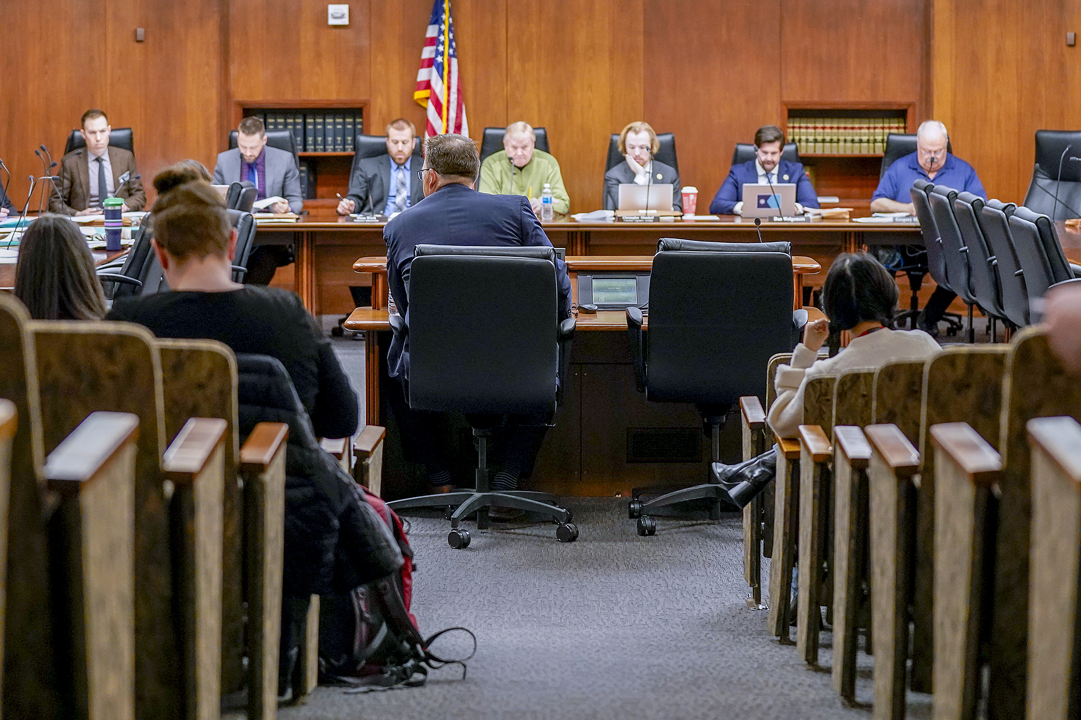 Office of Higher Education Commissioner Dennis Olson testifies March 21 before the House Higher Education Finance and Policy Committee regarding the higher education policy bill that received committee approval. (Photo by Michele Jokinen) 